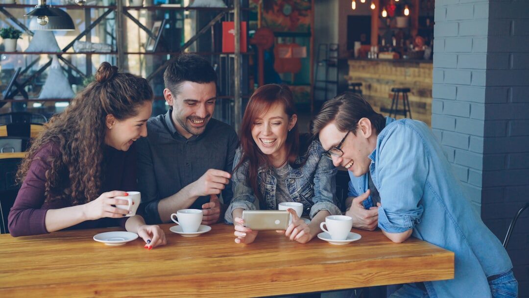 group of friends talking in cafe